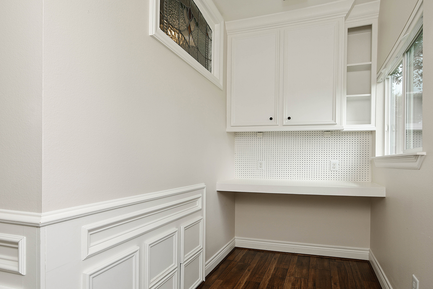Built-in desk nook with stained glass accent