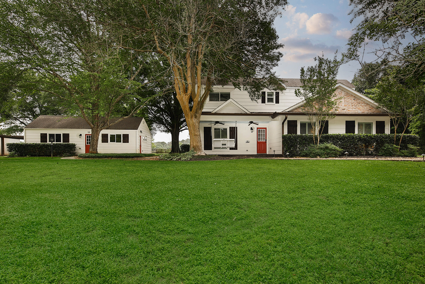 Guest house exterior across the lawn