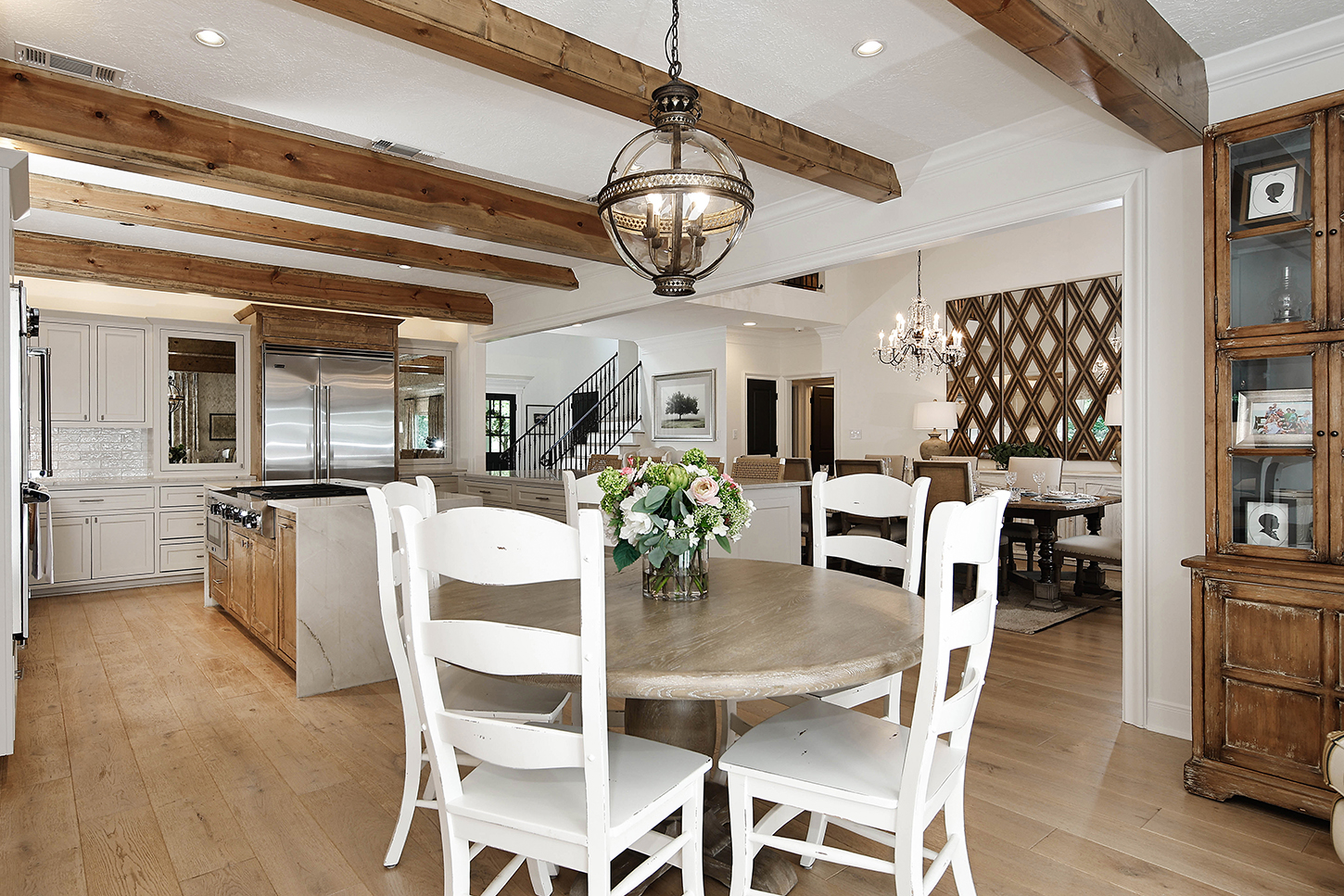Breakfast nook off the kitchen with round oak table