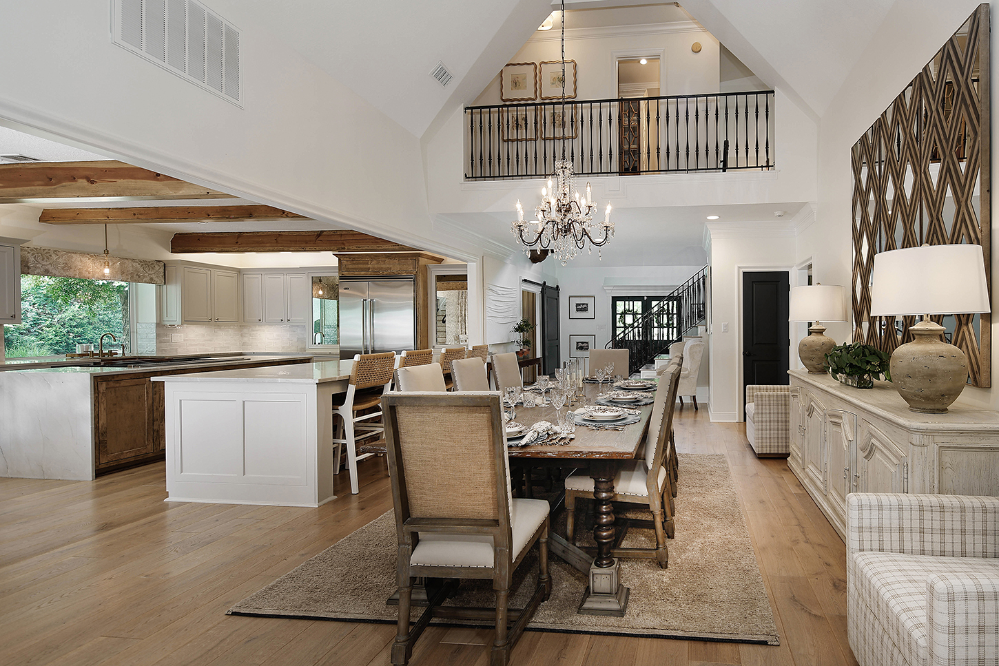 Great room with vaulted ceiling and dining table for ten
