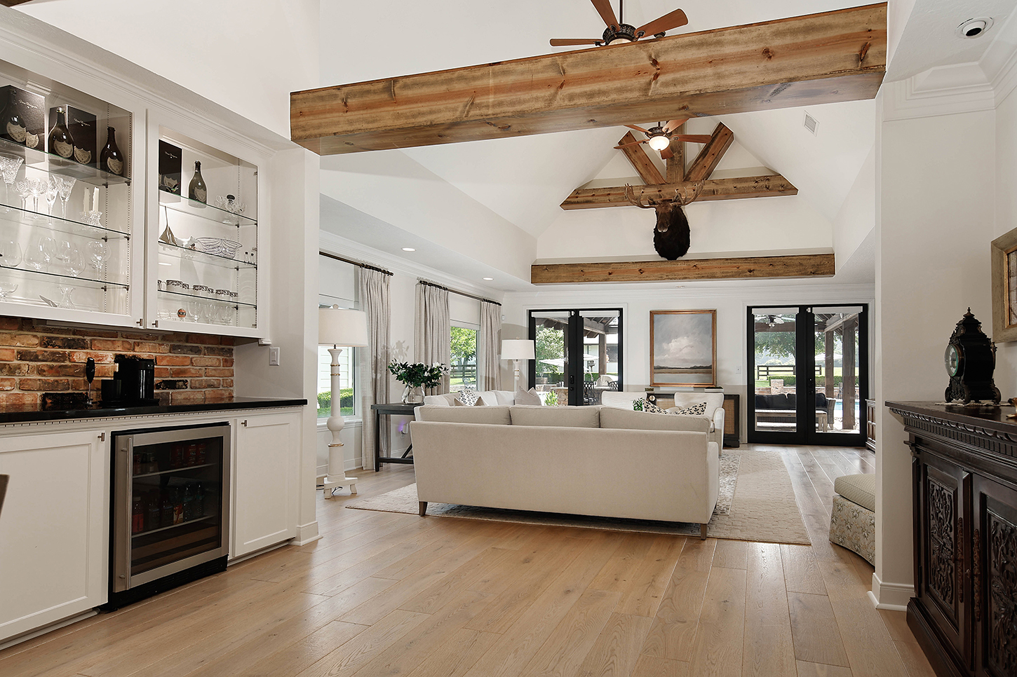 Living area with built-in bar and beverage fridge